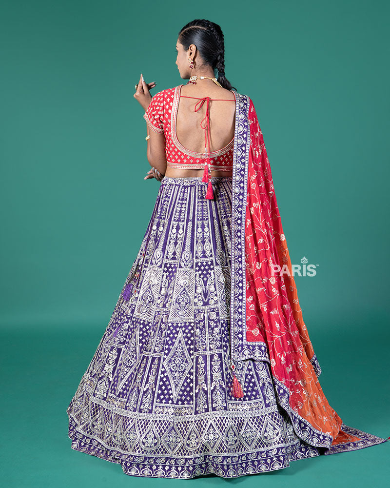 Vibrant Purple Lehenga Crimson Red Choli with Silver Embroidery and Red-Orange Dupatta