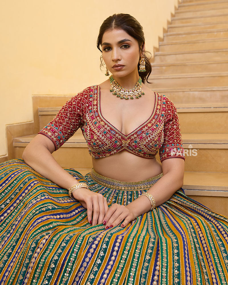 Multicolored Striped Lehenga with Embroidered Choli with Red Dupatta