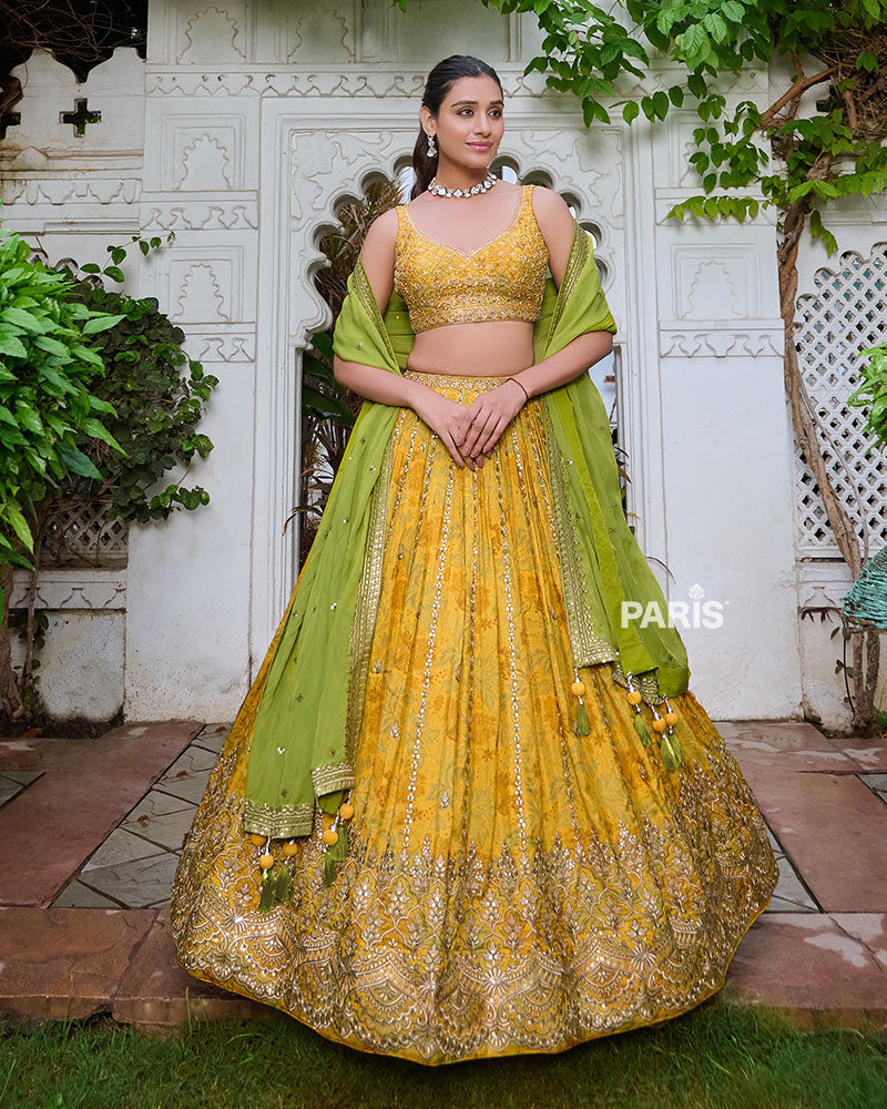 Yellow Lehenga Choli Embellished with Floral print and Sequence Work with Green Dupatta