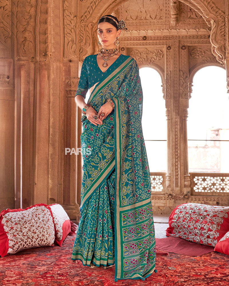 Teal Green Patola Printed Saree with Golden Zari Border and Unstitched Blouse 01