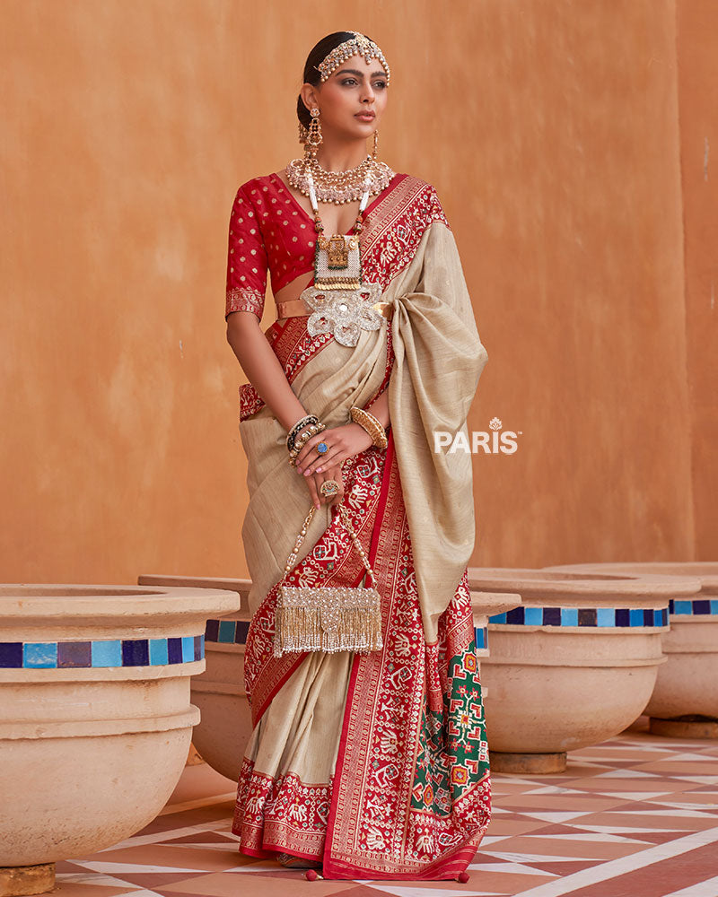 Cream Zari Weaving Red Border Saree in Patola Silk with Unstitched Blouse