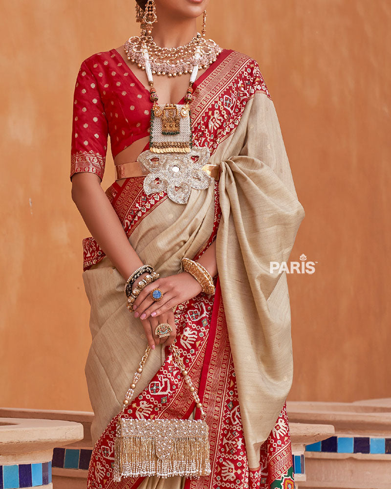 Cream Zari Weaving Red Border Saree in Patola Silk with Unstitched Blouse