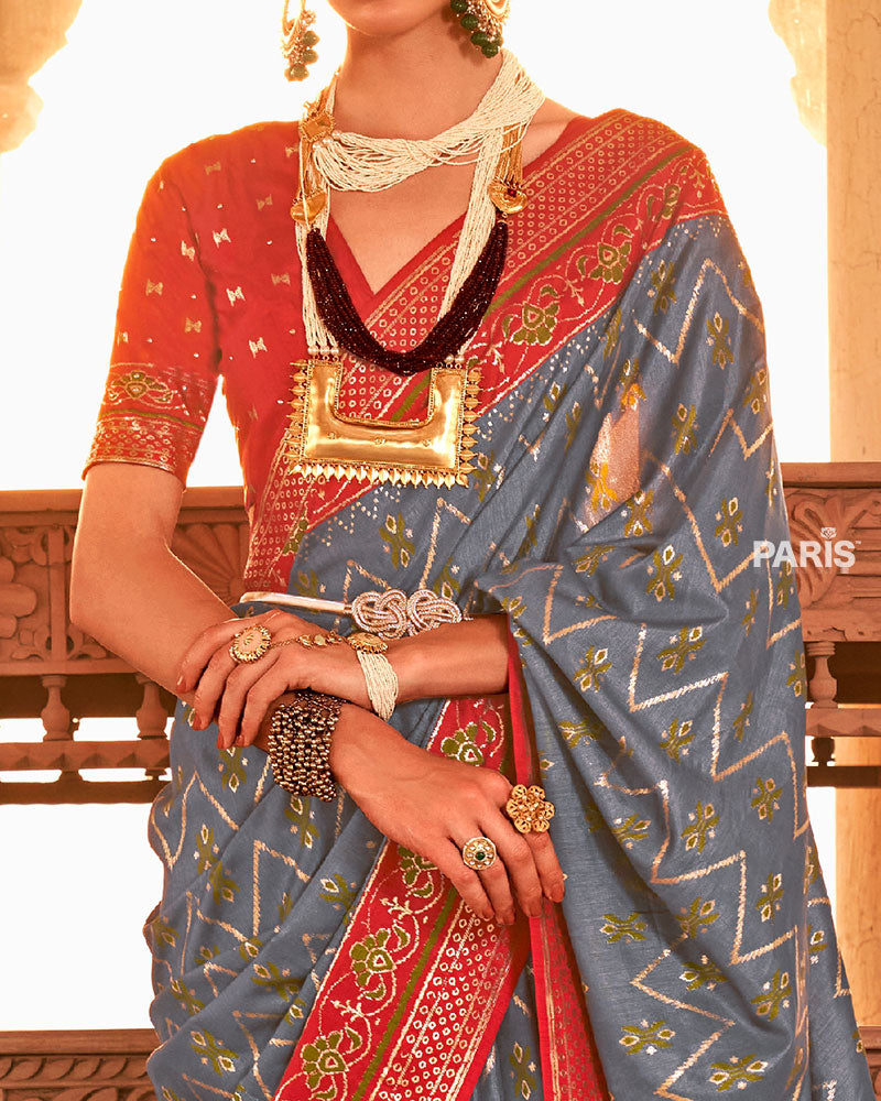 Steel Grey Ikat Printed and Red Contrast Border Patola Silk Saree with Unstitched Blouse