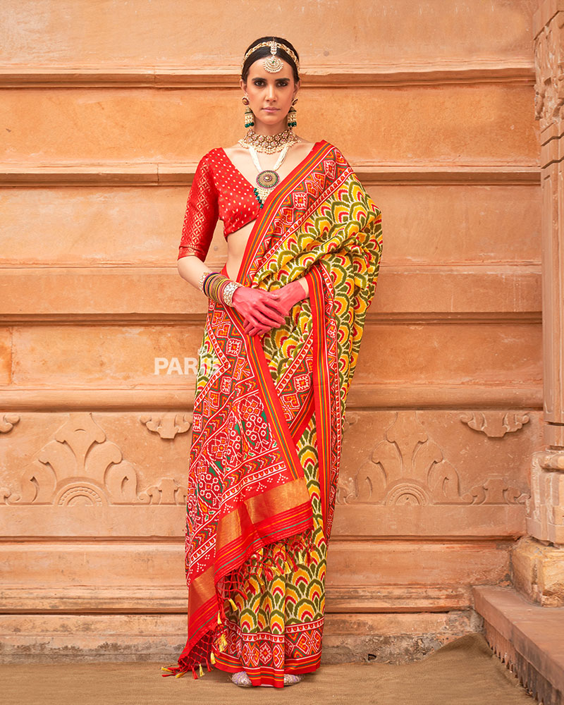 Blue Silk Patola Saree with Pink Zari Border