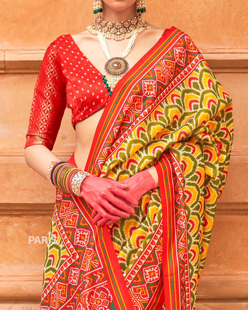 Blue Silk Patola Saree with Pink Zari Border