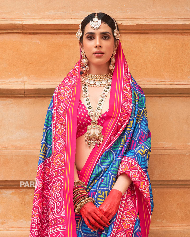 Ivory Patola Silk Saree with Red Zari Border