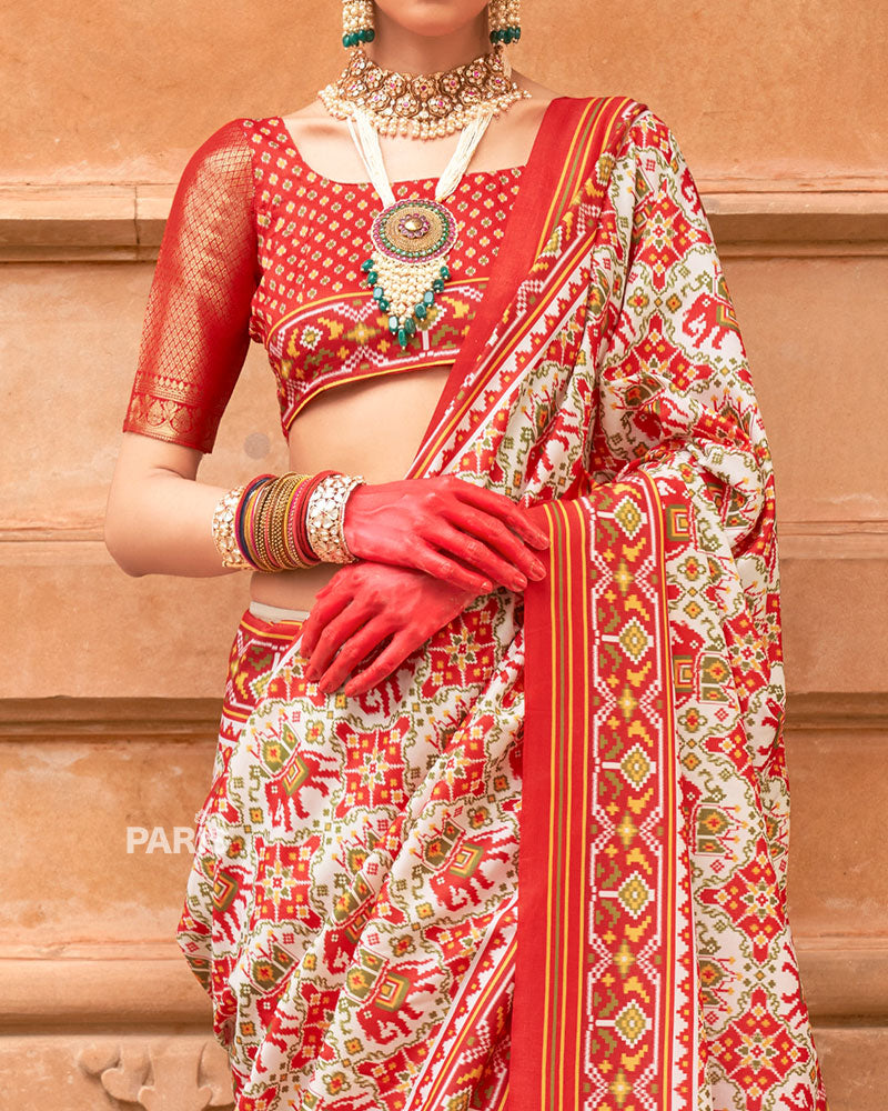 Red Patola Silk Saree with Green Zari Border