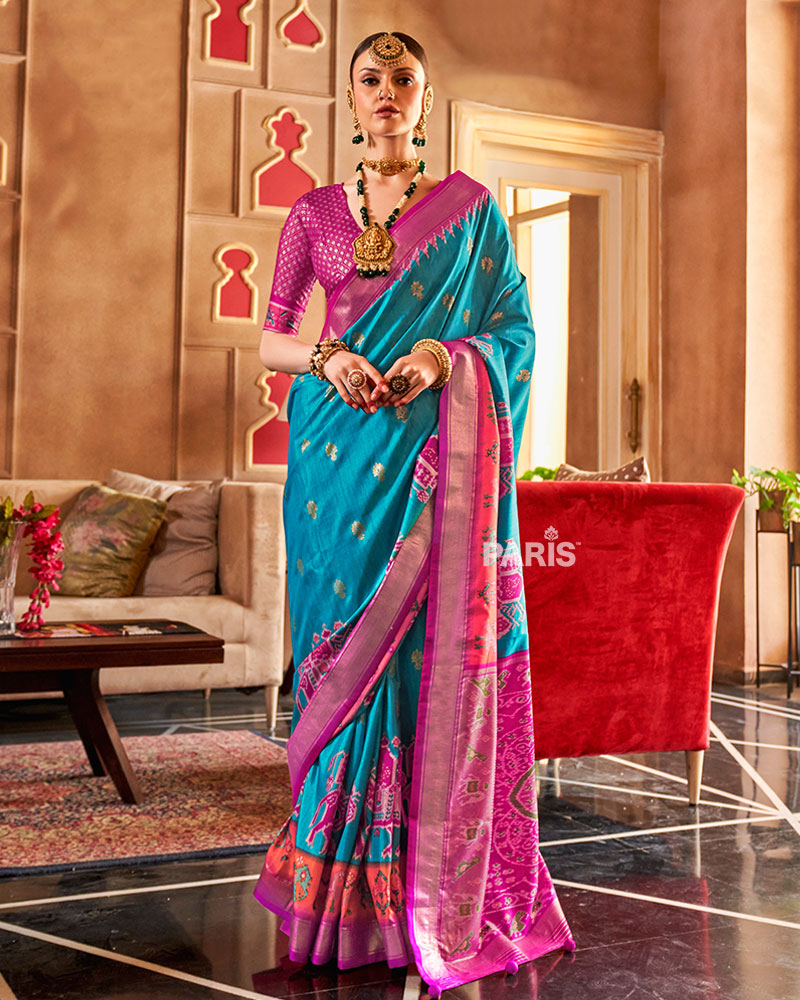 Teal Blue Ikat Silk Saree with Magenta Border & Motifs