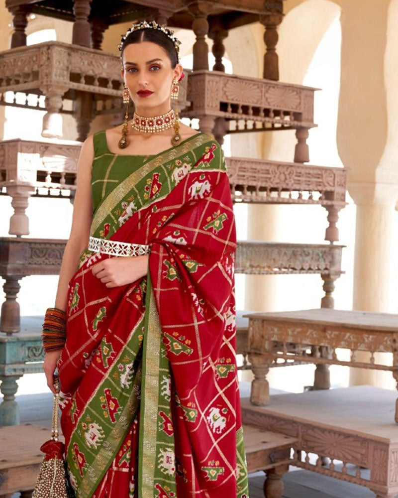 Red Elephant Print Saree with Contrast Border & Tassels