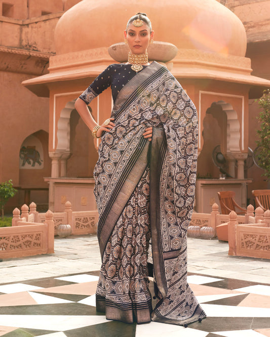 Brown Ikat Printed Silk Saree With Zari Woven Pallu and Tassel