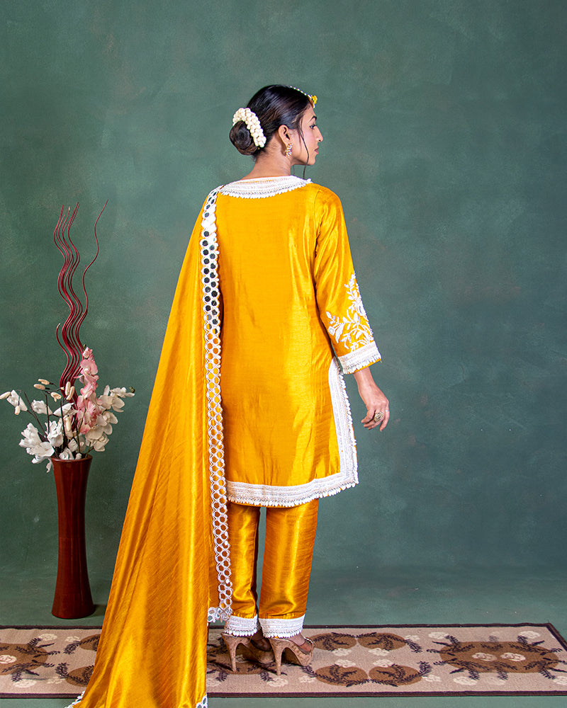 Yellow straight cut kurta with pant and dupatta in crepe silk