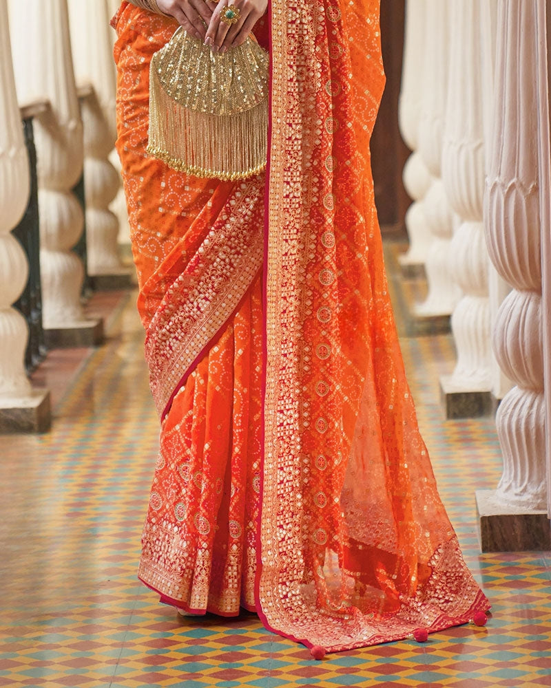Orange Pure Georgette Embroidered Saree with Unstitched Blouse