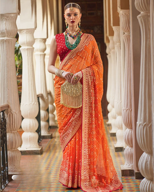 Orange Pure Georgette Embroidered Saree with Unstitched Blouse