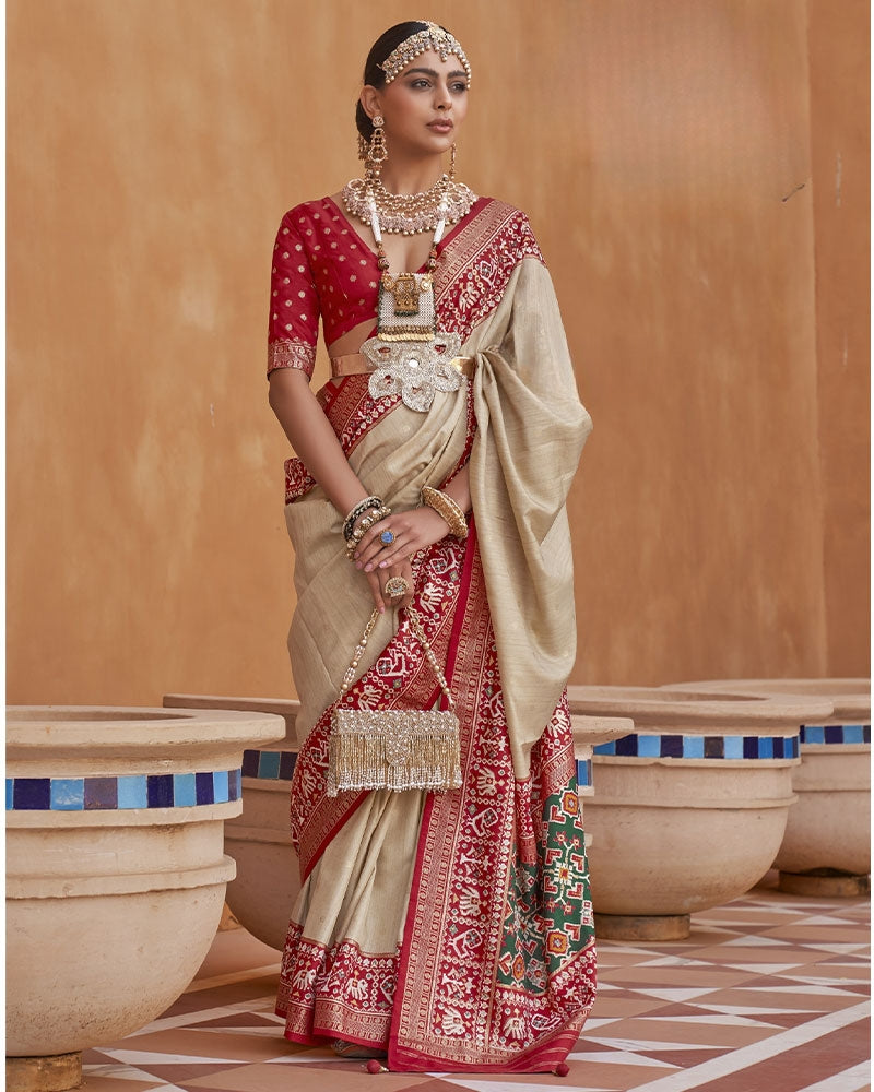 Beige Pure Patola Silk Saree with Printed Border and Unstitched Blouse Piece