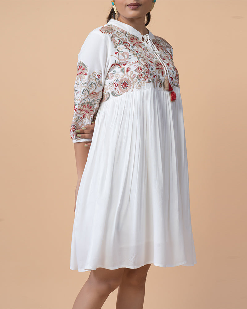 Chic Knee-Length Dress with Intricate Embroidery and Long Sleeves