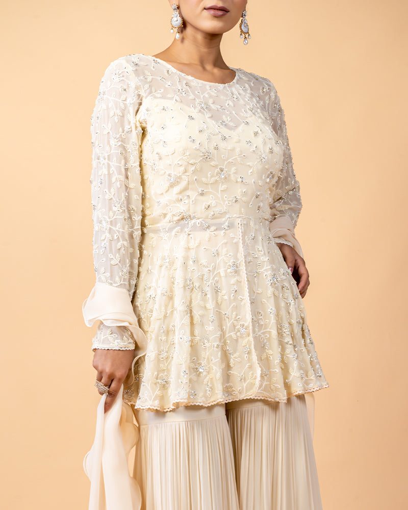 Cream Peplum Top Style Palazzo Suit with Ruffled Dupatta