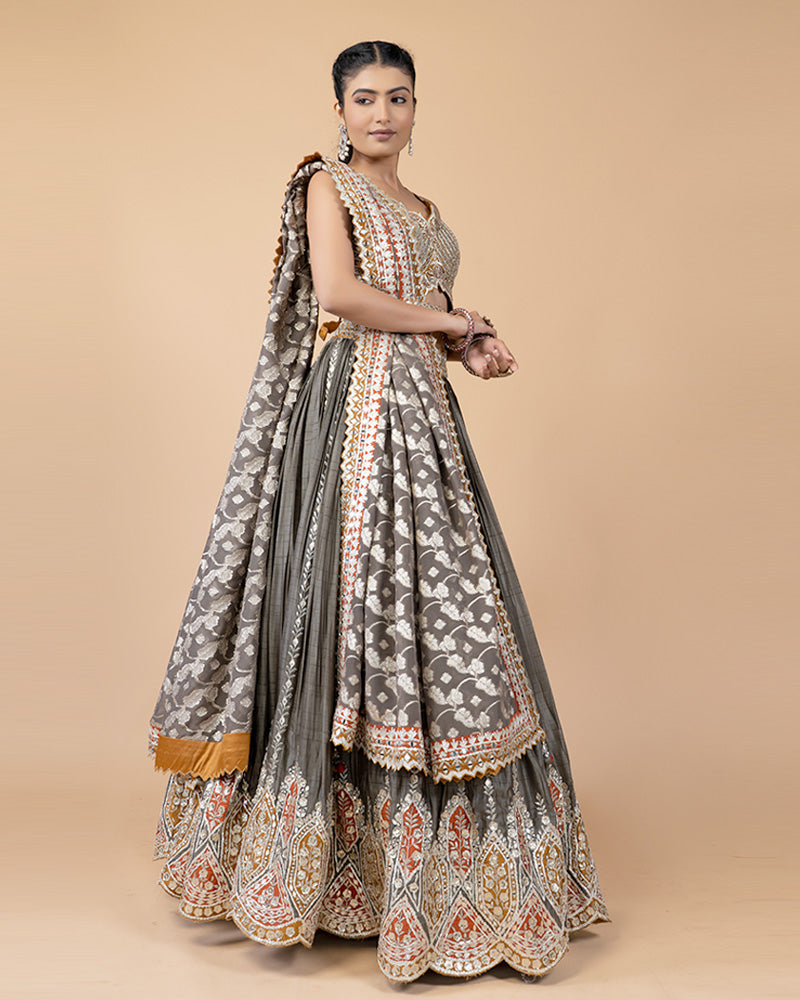 Grey Lehenga with Contrast Orange Hand Embellished Choli and Silk Dupatta