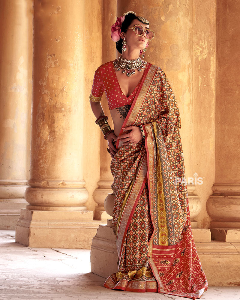 Beige Patola Silk Saree – Orange Zari Border, Classic Festive Look