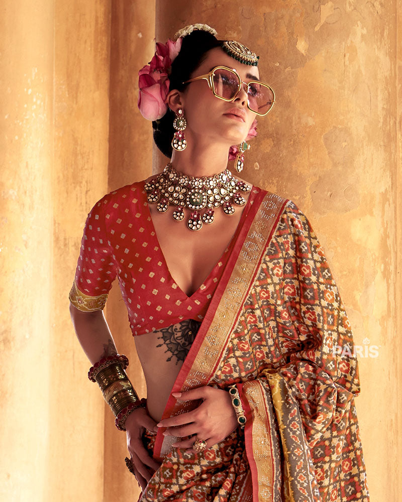 Beige Patola Silk Saree – Orange Zari Border, Classic Festive Look