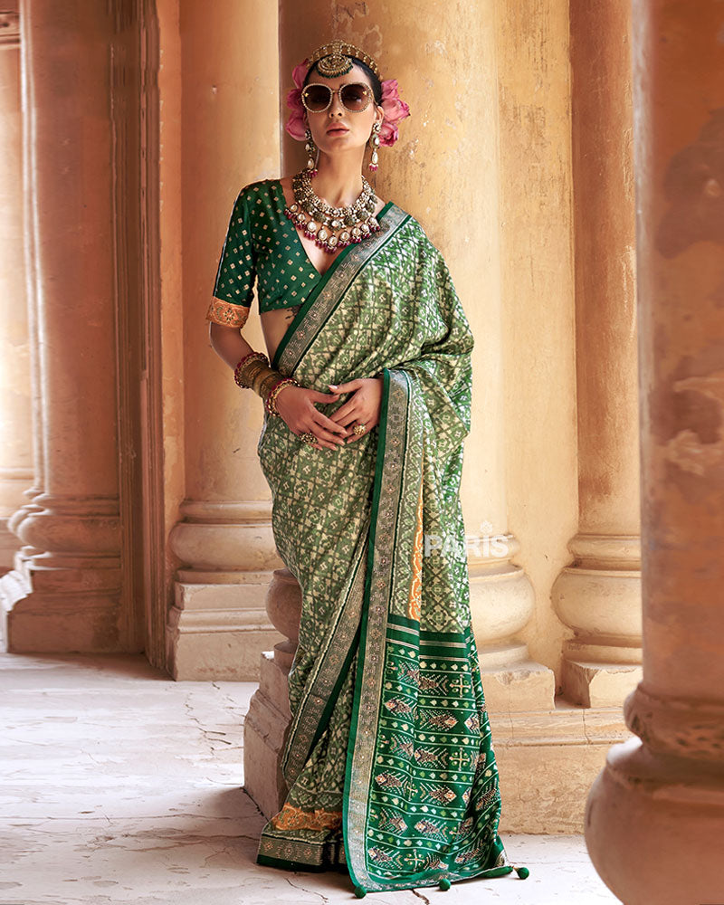 Light Green Patola Silk Saree – Zari Embellished Festive Wear