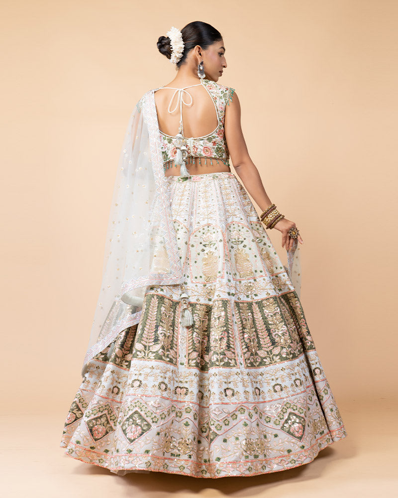 Light Pista Lehenga Choli Embellished with Hand Work and Sequence Heavy Work Border with Net Dupatta