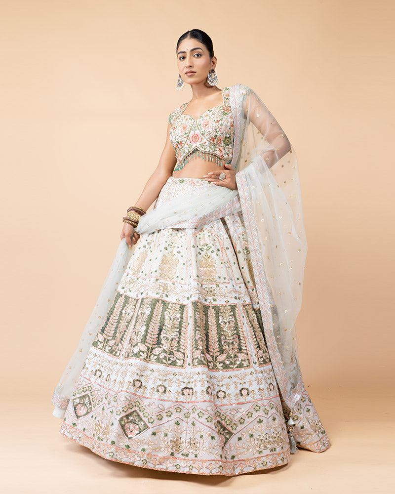 Light Pista Lehenga Choli Embellished with Hand Work and Sequence Heavy Work Border with Net Dupatta