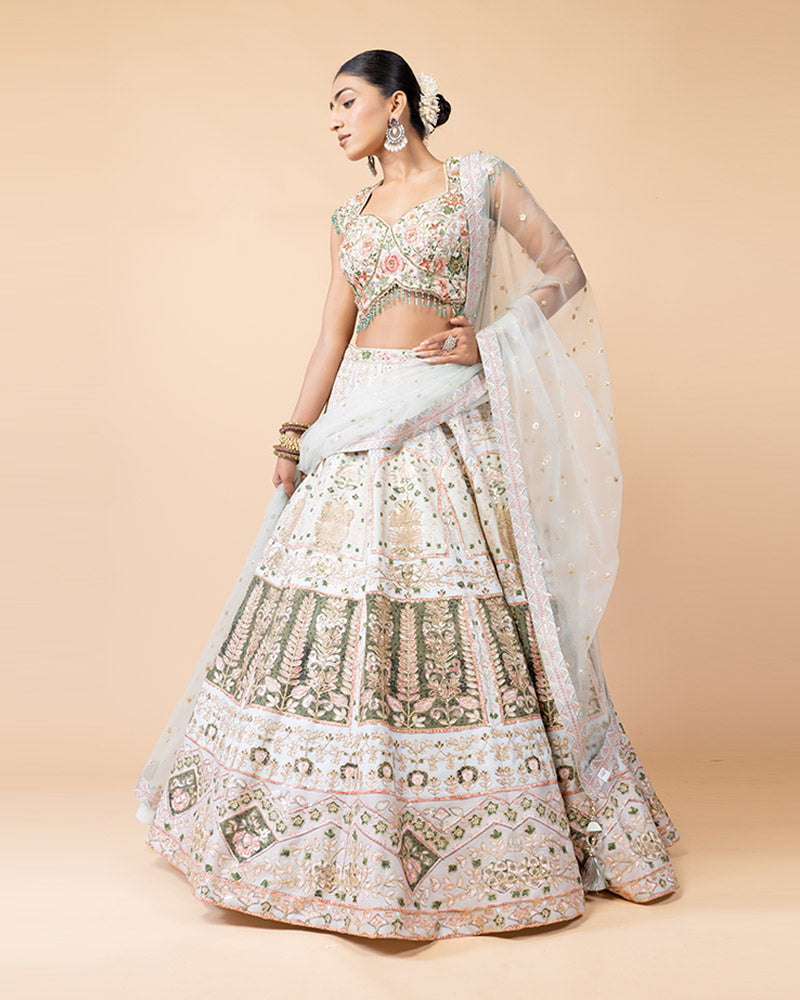 Light Pista Lehenga Choli Embellished with Hand Work and Sequence Heavy Work Border with Net Dupatta