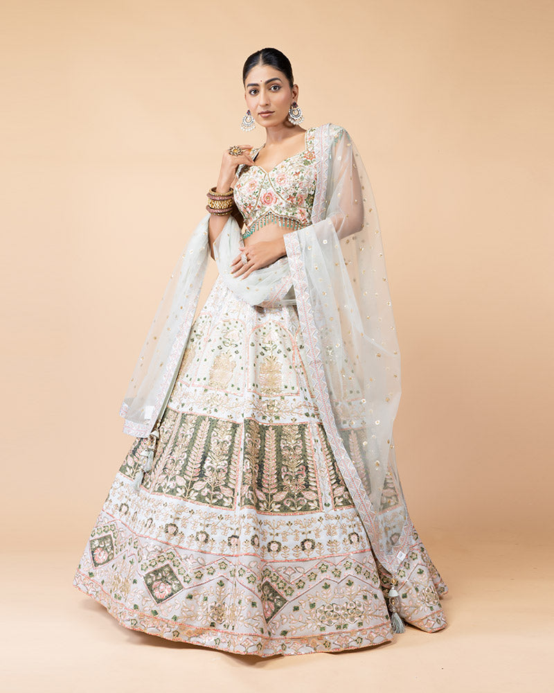 Light Pista Lehenga Choli Embellished with Hand Work and Sequence Heavy Work Border with Net Dupatta