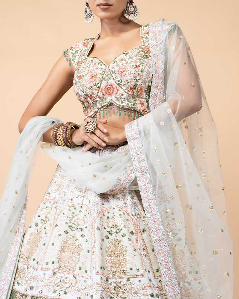 Light Pista Lehenga Choli Embellished with Hand Work and Sequence Heavy Work Border with Net Dupatta