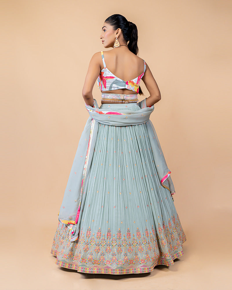 Light Turquoise Lehenga Choli with Sleeveless Choli and Net Dupatta