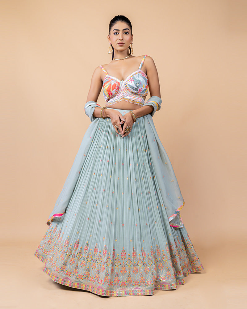 Light Turquoise Lehenga Choli with Sleeveless Choli and Net Dupatta