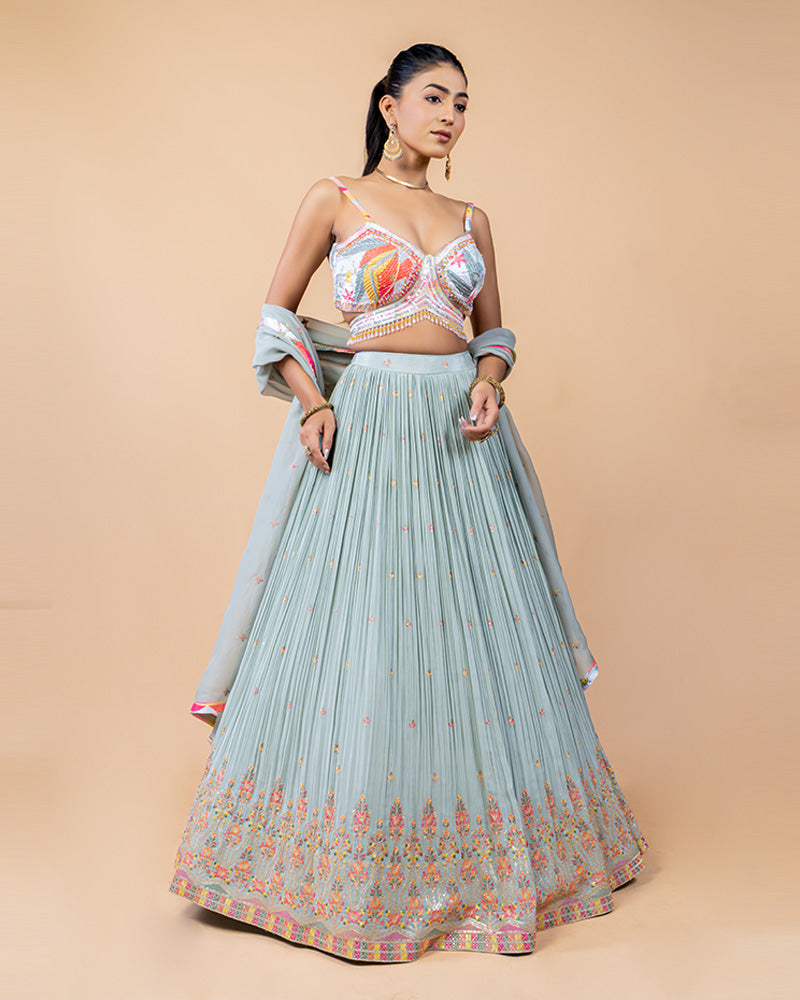 Light Turquoise Lehenga Choli with Sleeveless Choli and Net Dupatta