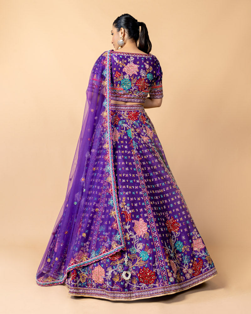 Purple Lehenga Choli with Zardozi work and Net Dupatta