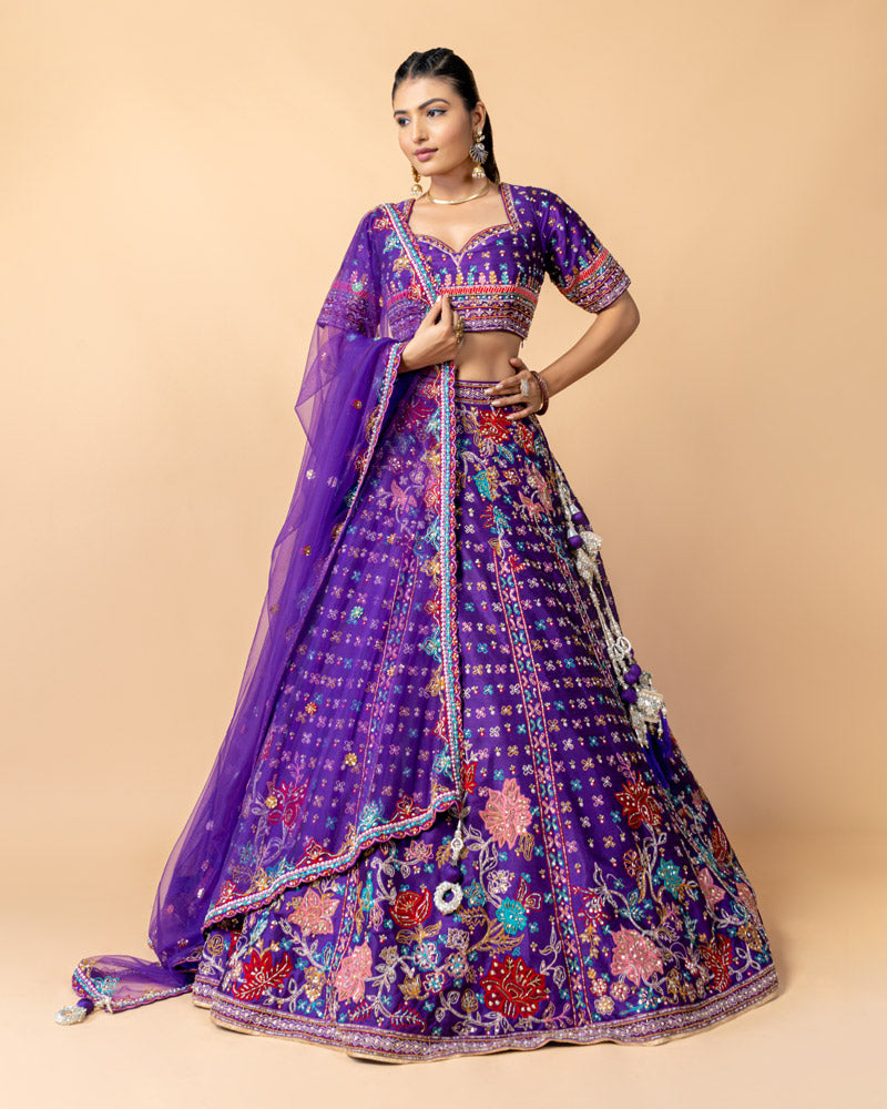 Purple Lehenga Choli with Zardozi work and Net Dupatta