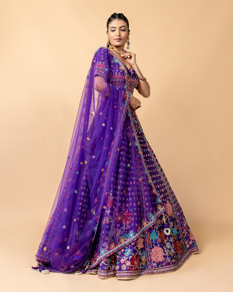 Purple Lehenga Choli with Zardozi work and Net Dupatta