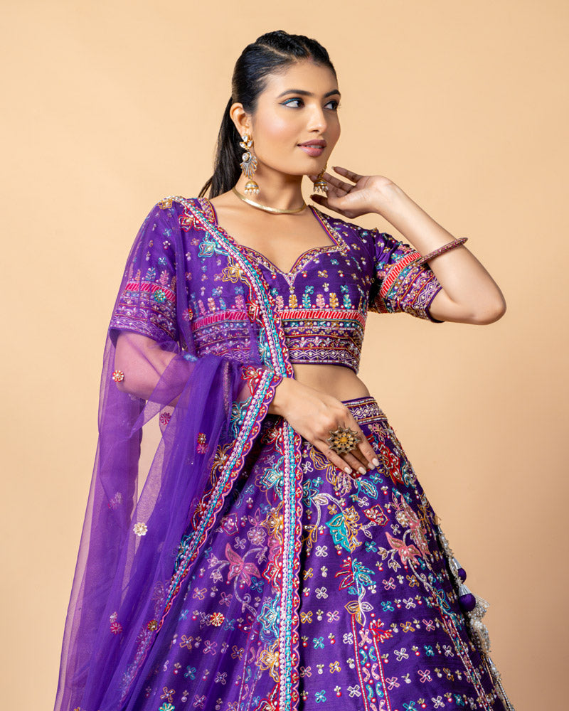 Purple Lehenga Choli with Zardozi work and Net Dupatta