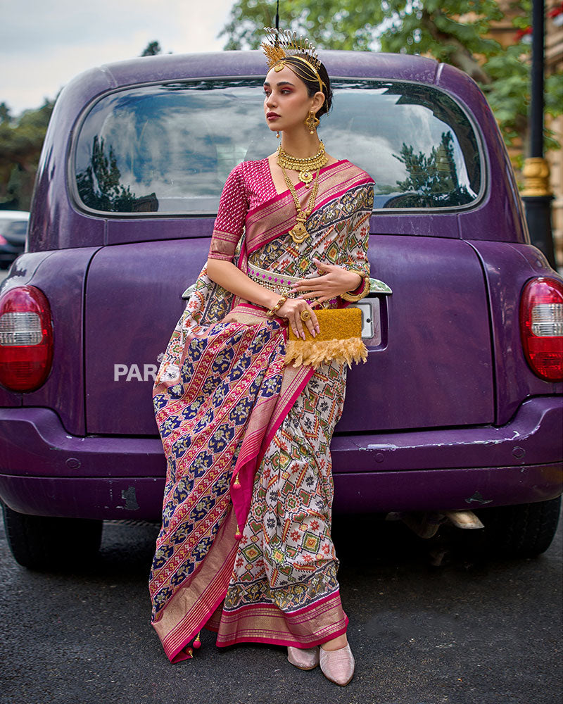 White, Pink and Gold Patola Printed Saree with Zari Border & Unstitched Blouse