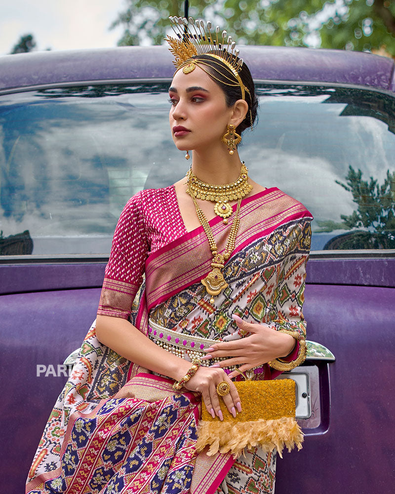 White, Pink and Gold Patola Printed Saree with Zari Border & Unstitched Blouse