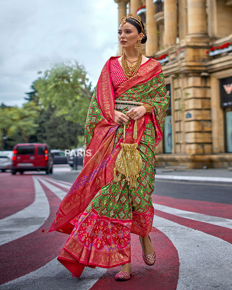 Green and Pink Patola Printed Saree with Zari Border and Unstitched Blouse