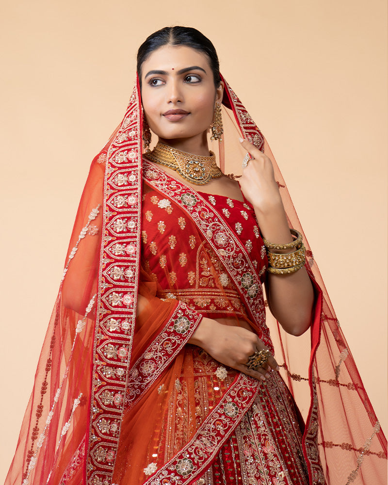 Red Semi-Stitched Bridal Lehenga Embellished with Hand Work and Net Dupatta