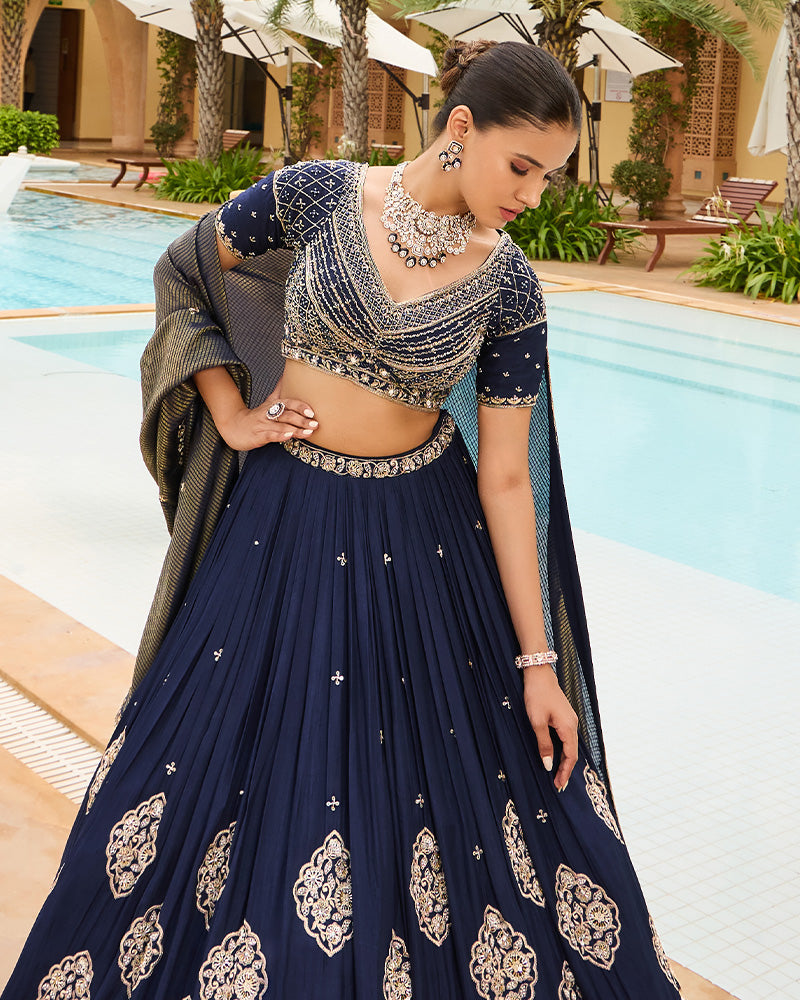 Royal Blue Lehenga Choli with Plunging Neckline and Hand Embroidered