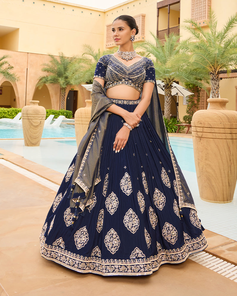 Royal Blue Lehenga Choli with Plunging Neckline and Hand Embroidered