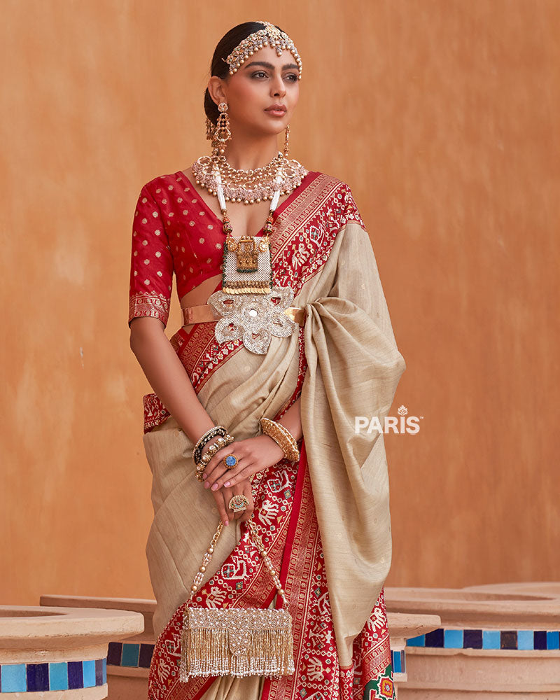 Cream Zari Weaving Red Border Saree in Patola Silk with Unstitched Blouse