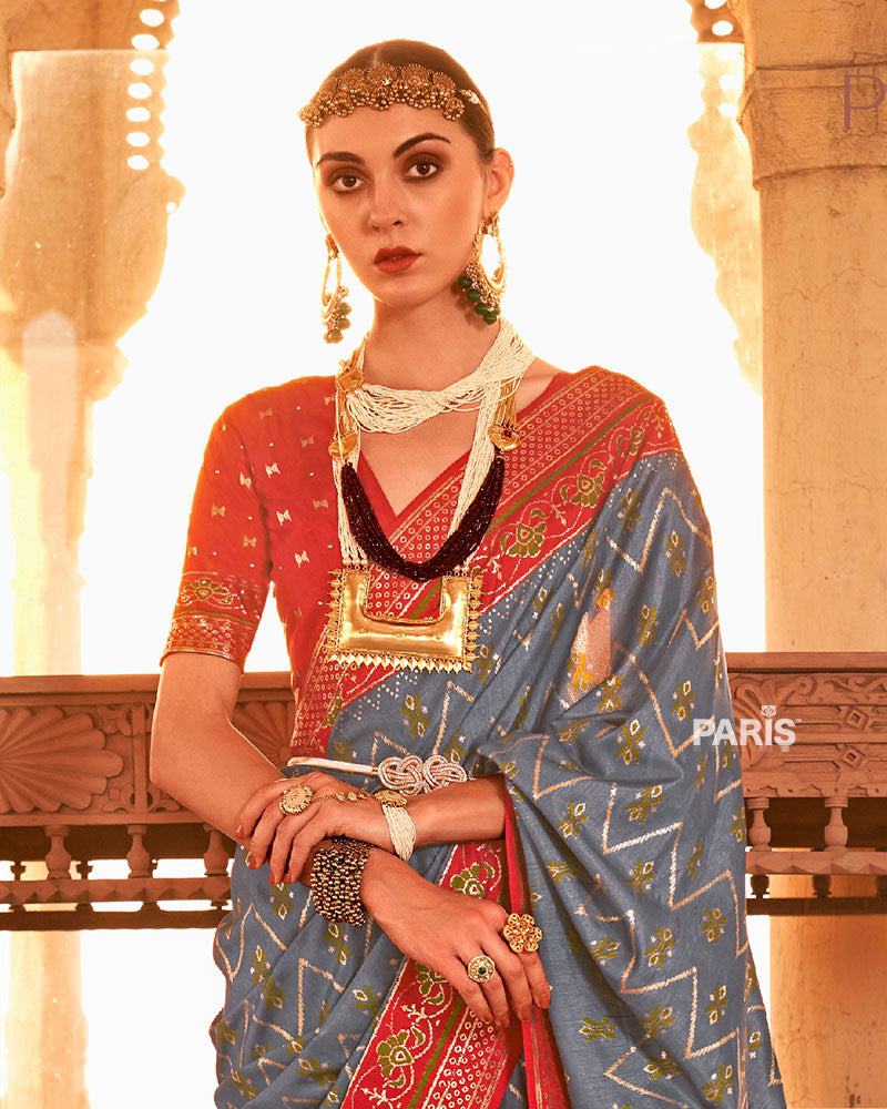 Steel Grey Ikat Printed and Red Contrast Border Patola Silk Saree with Unstitched Blouse