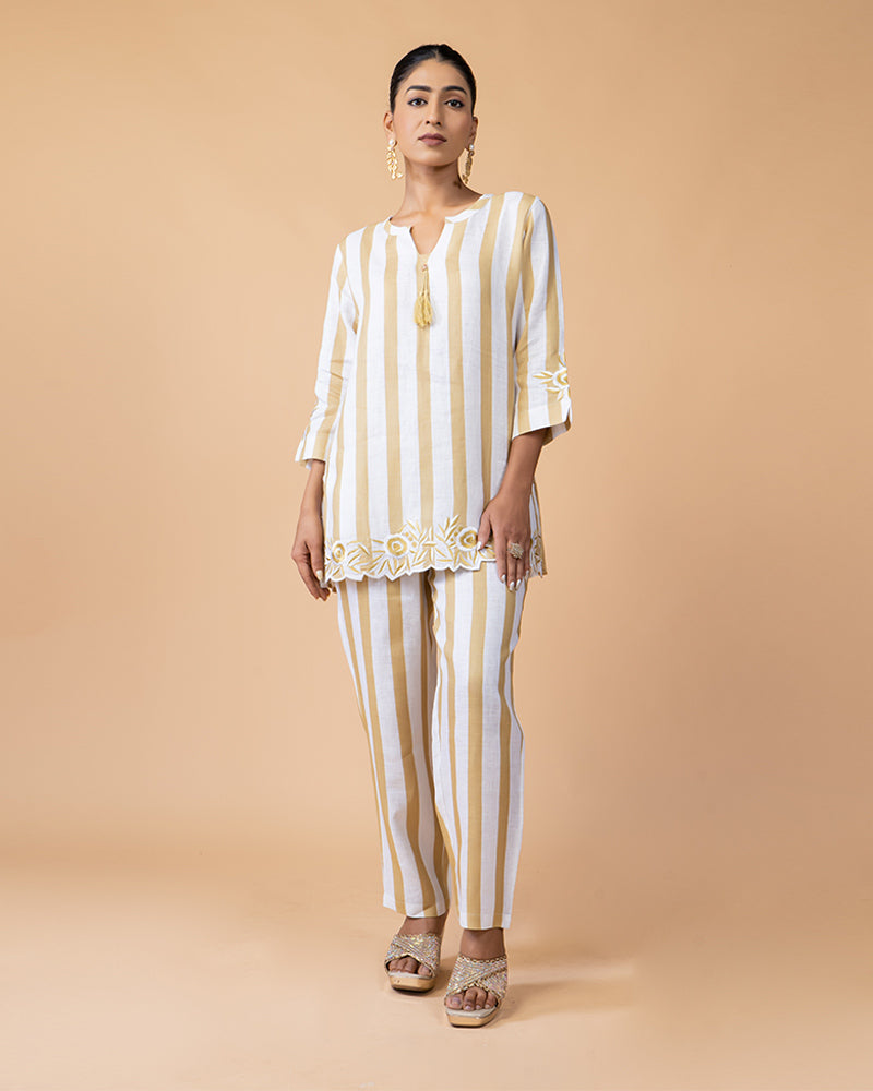 White Top with Golden Stripes and Embroidered Border, Paired with Matching Pants