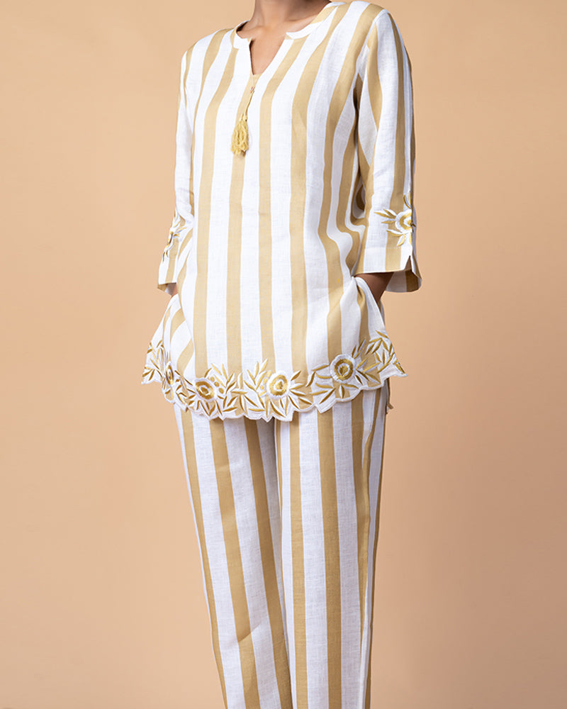 White Top with Golden Stripes and Embroidered Border, Paired with Matching Pants